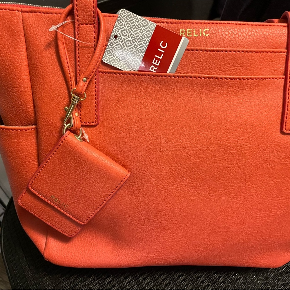 NWT Relic purse. Coral colored.